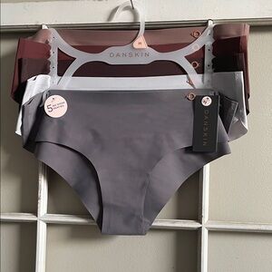 Five pairs of Danskin Women's Seamless Panties in Gray, Brown, and Maroon